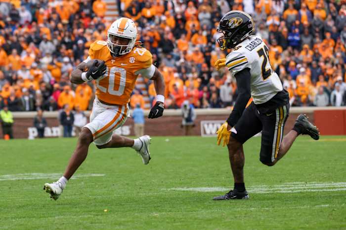 Nov 12, 2022; Knoxville, Tennessee, USA; Tennessee Volunteers running back Jaylen Wright (20) runs the ball against Missouri Tigers defensive back Joseph Charleston (28) during the second half at Neyland Stadium.